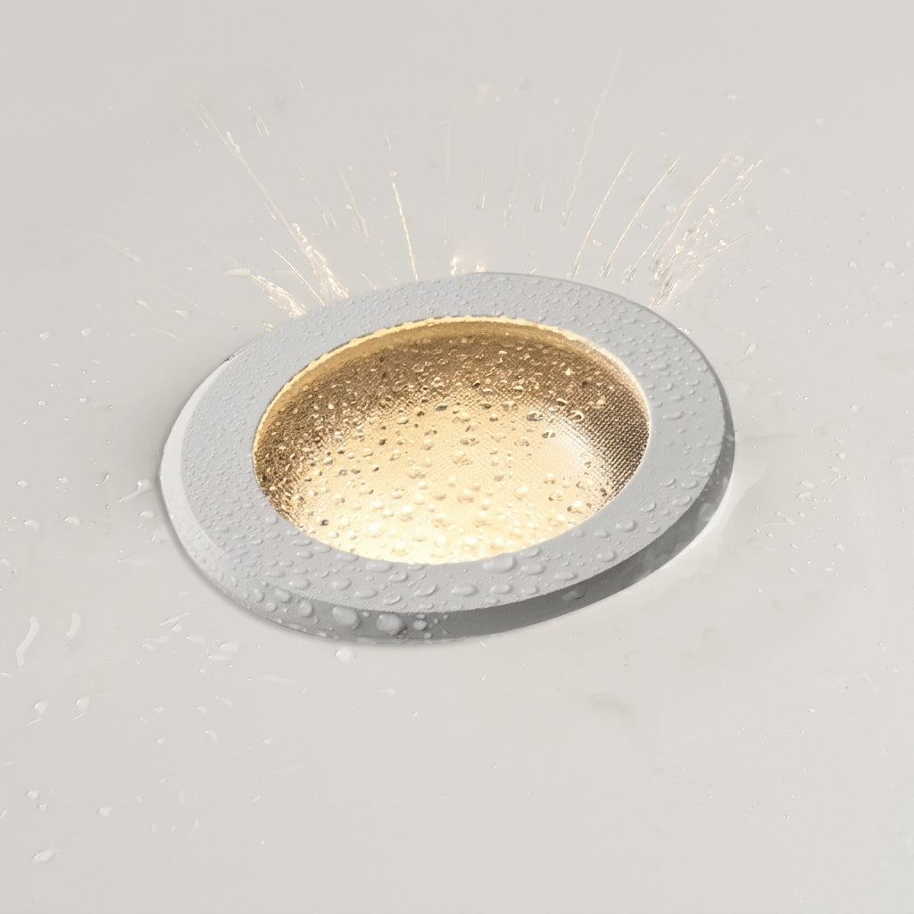 Aztil LED downlight installed in a ceiling, close-up