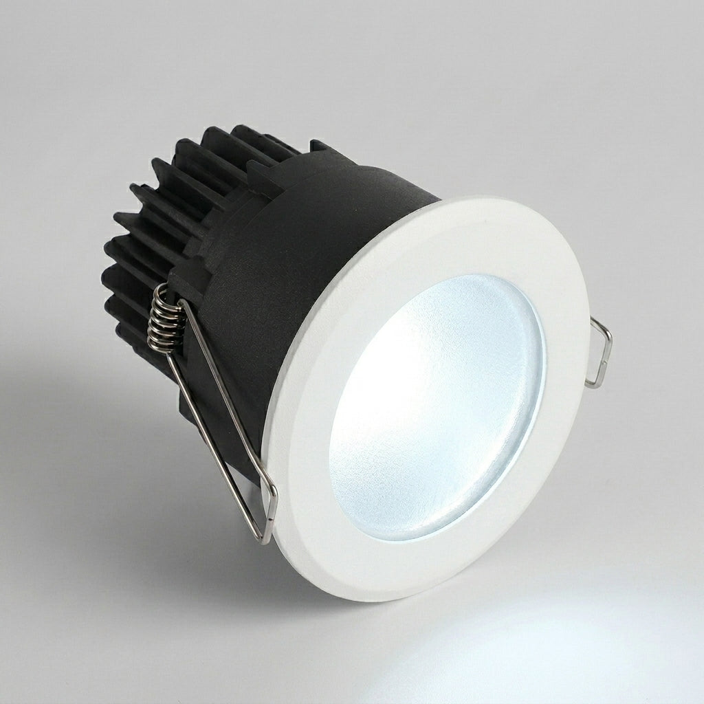Aztil IP65 waterproof LED downlight, angled hero shot with cool light on