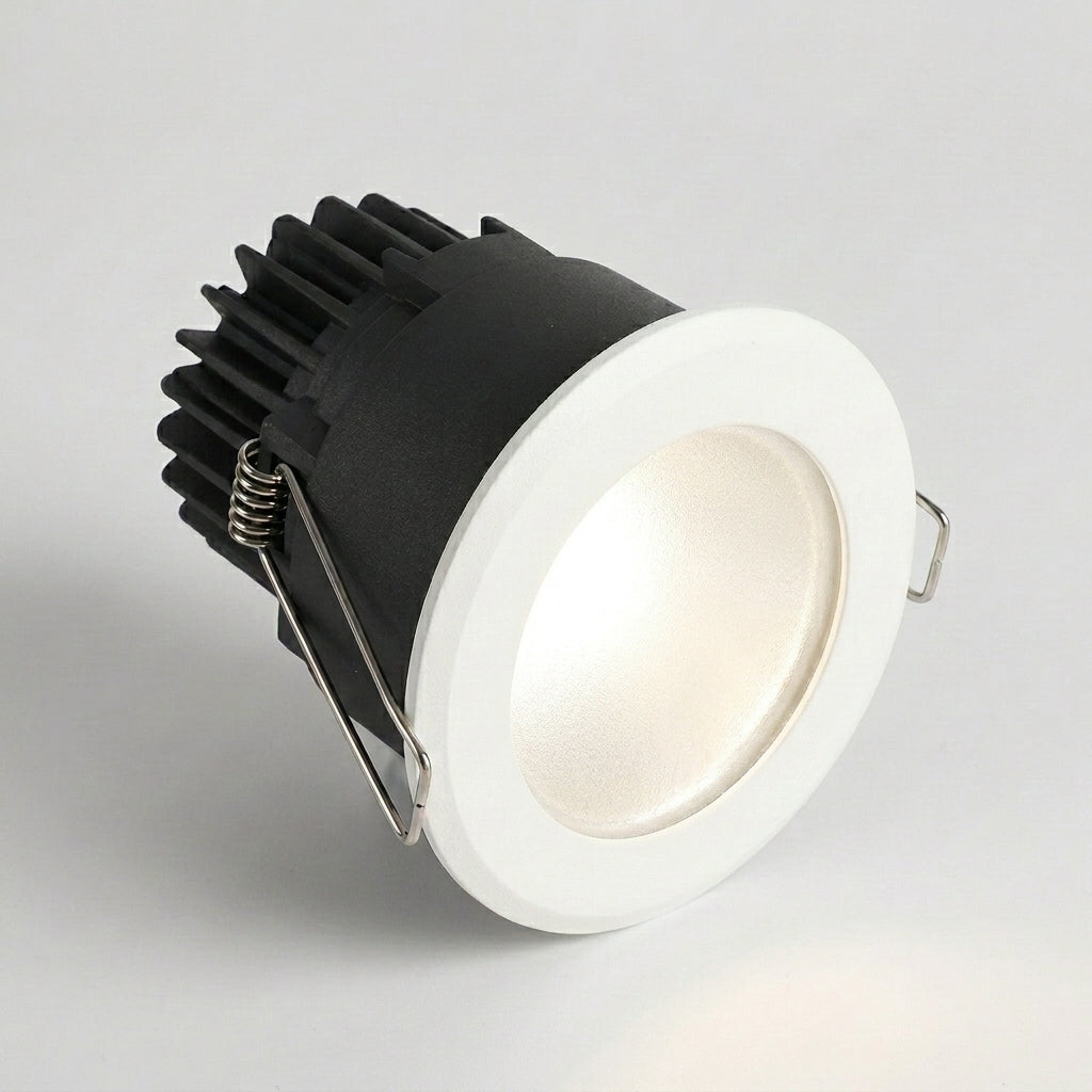 Aztil IP65 waterproof LED downlight, angled hero shot with neutral light on