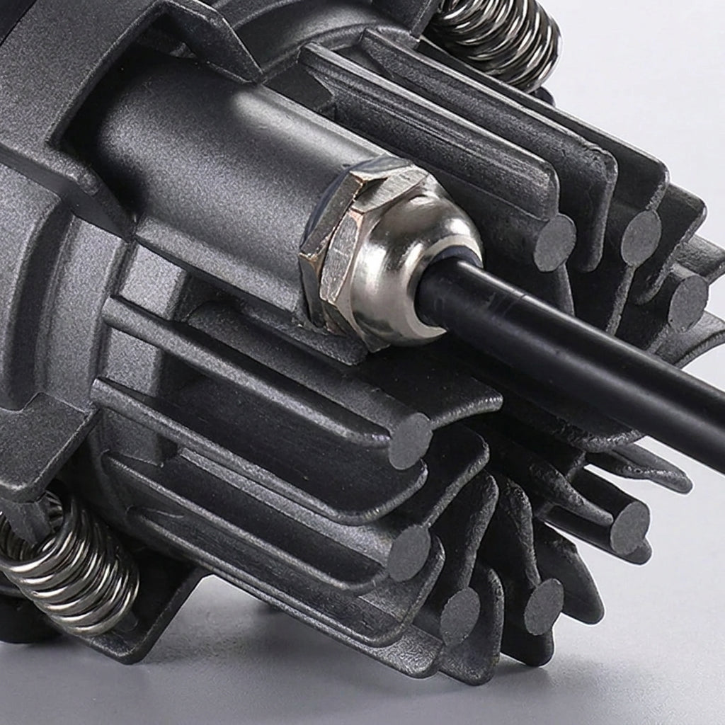Close-up of the Aztil downlight's finned metal heatsink housing
