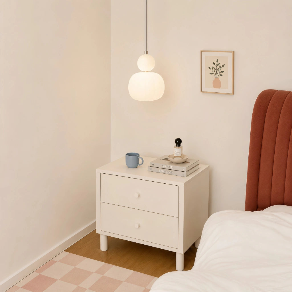 Beige Bauhaus pendant styled as an elegant, space-saving bedside reading light