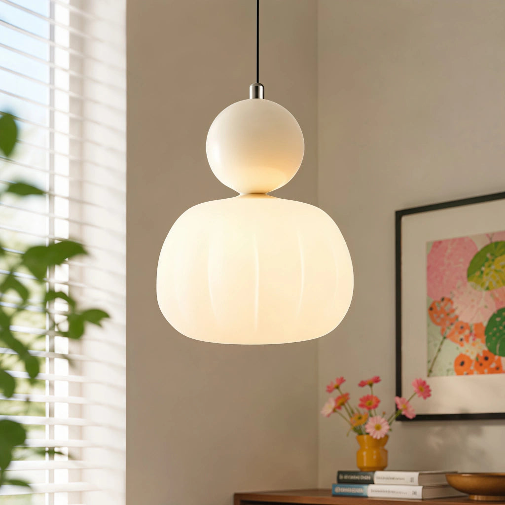 Beige Bauhaus macaron pendant light providing warm, diffused illumination in a modern room