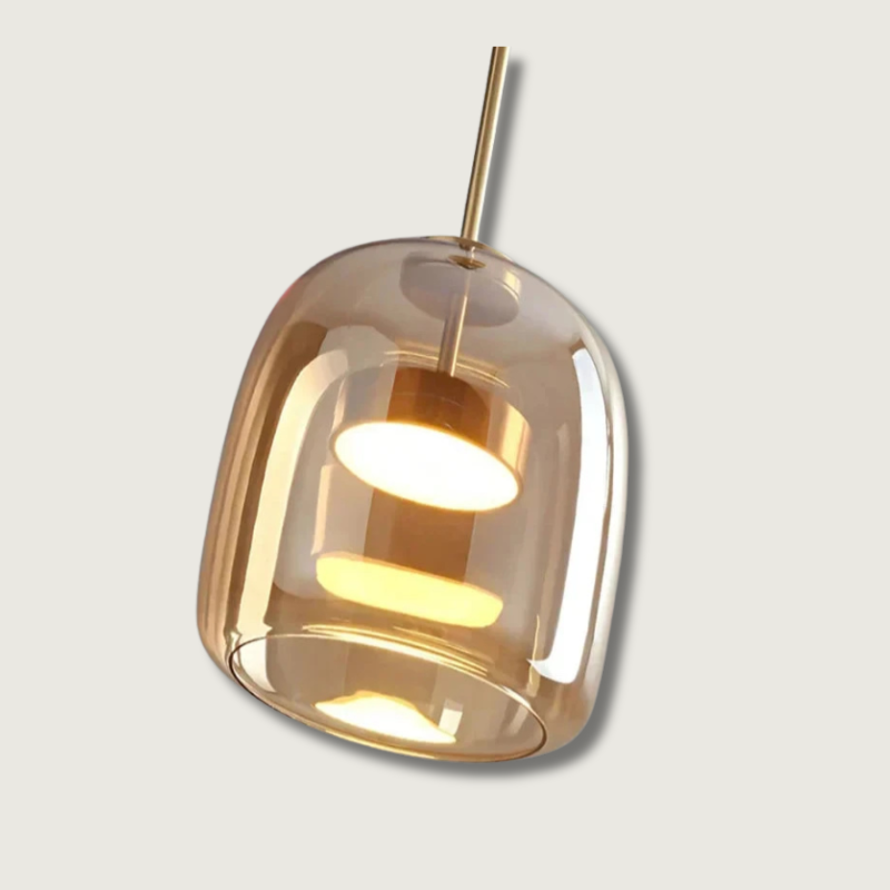 Angled view of the amber glass beqi pendant showcasing the illuminated inner LED cylinder