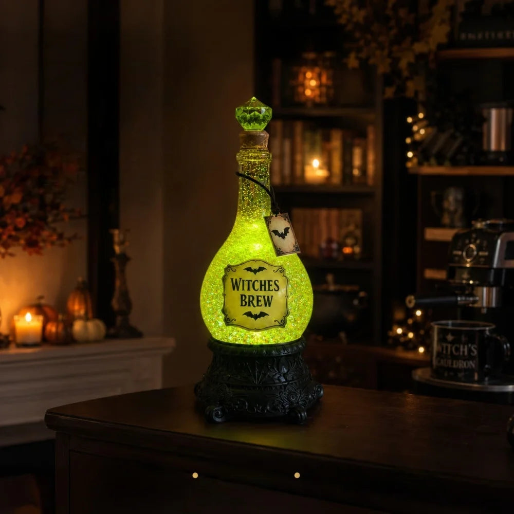 Bevvy witches brew LED glitter potion bottle glowing on a kitchen counter