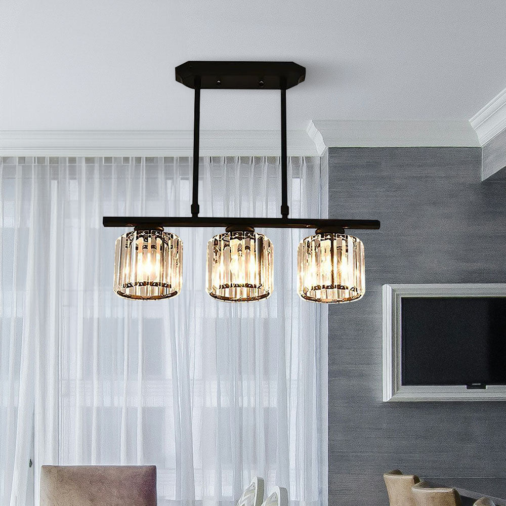 Black 3-light linear pendant with round ribbed glass shades in a bright living area
