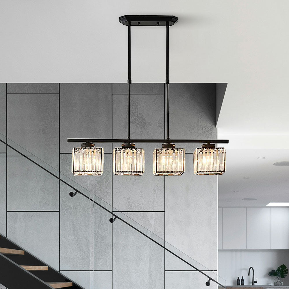Black 4-light linear pendant with round ribbed glass shades installed near a modern staircase