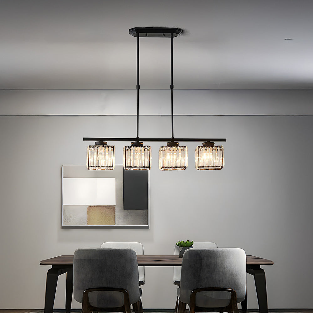 Black 4-light square ribbed glass pendant illuminating a minimalist grey dining room