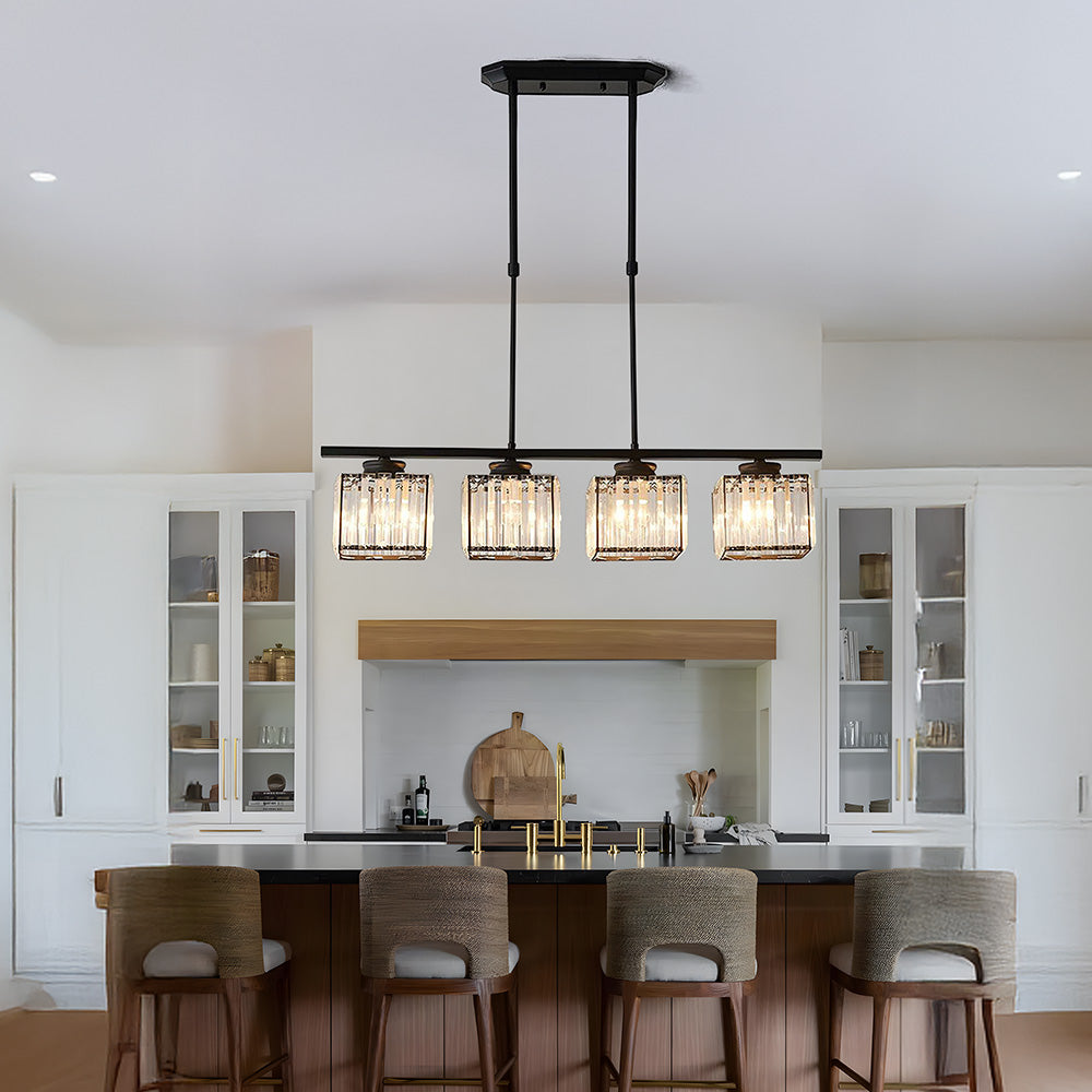 Black 4-light square glass island pendant in a bright, modern white kitchen space