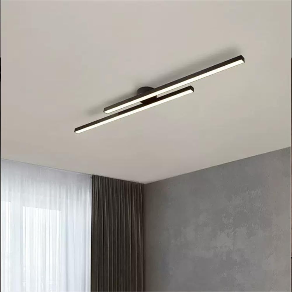 Black linear LED lamp providing bright, even illumination in an open-plan living room