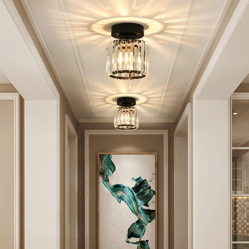 Two black round crystal prism flush mount ceiling lights in a bright contemporary hallway