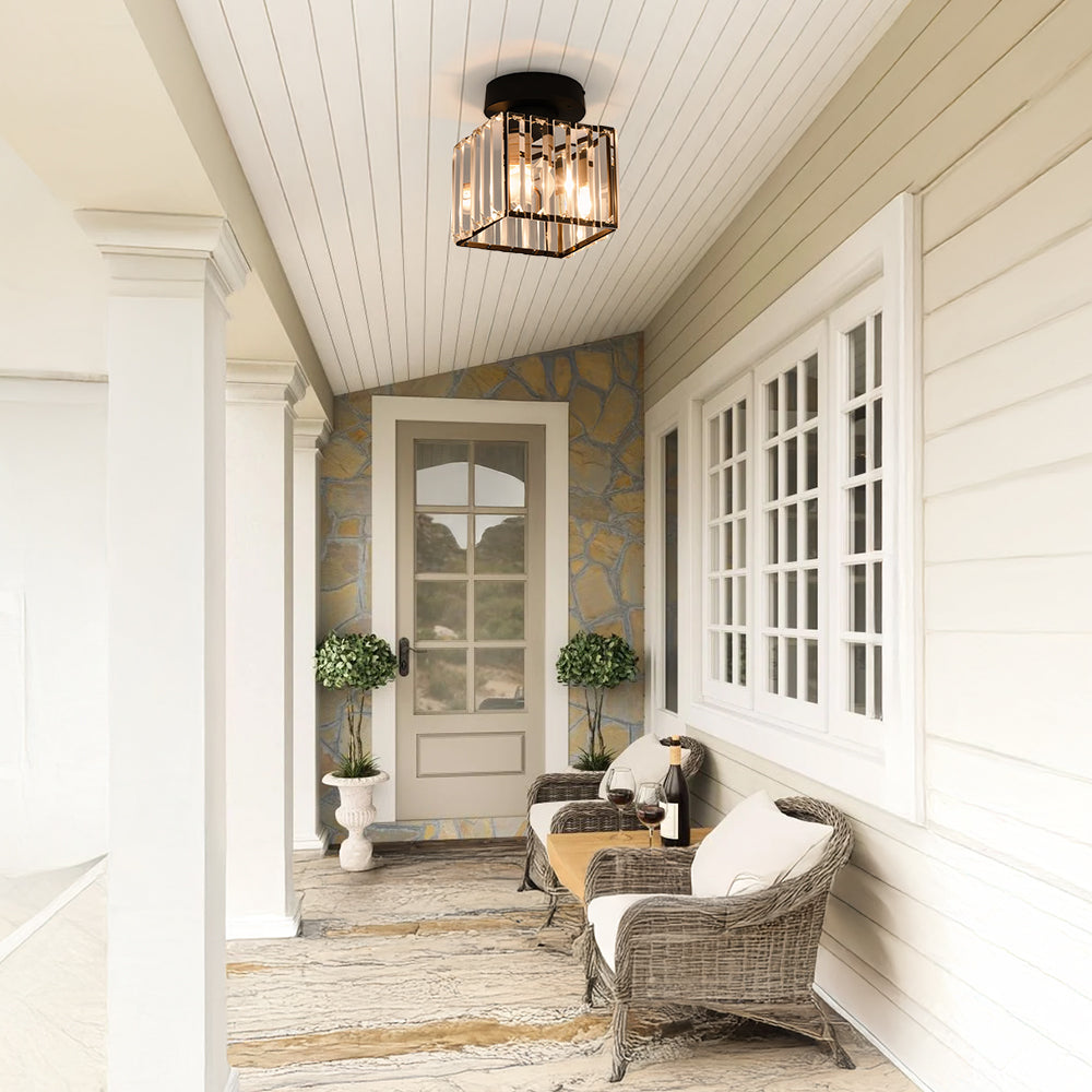 Black square crystal flush mount fixture installed on a covered porch ceiling