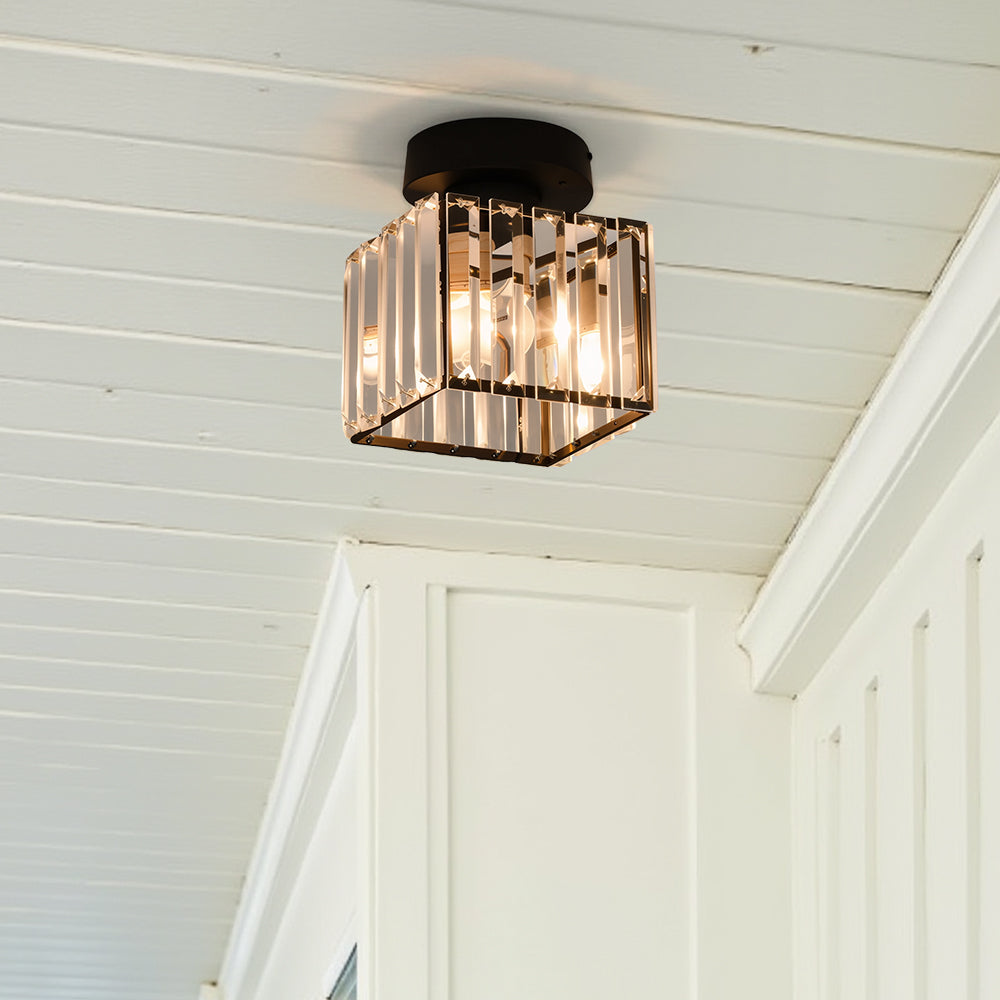 Single black square crystal prism ceiling lamp isolated on a white ceiling