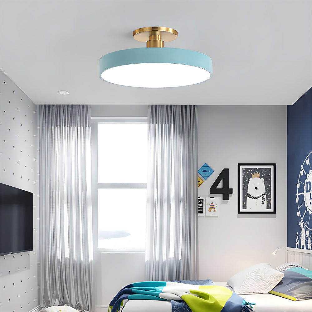 blue drum ceiling lighting illuminating a contemporary bright bedroom space