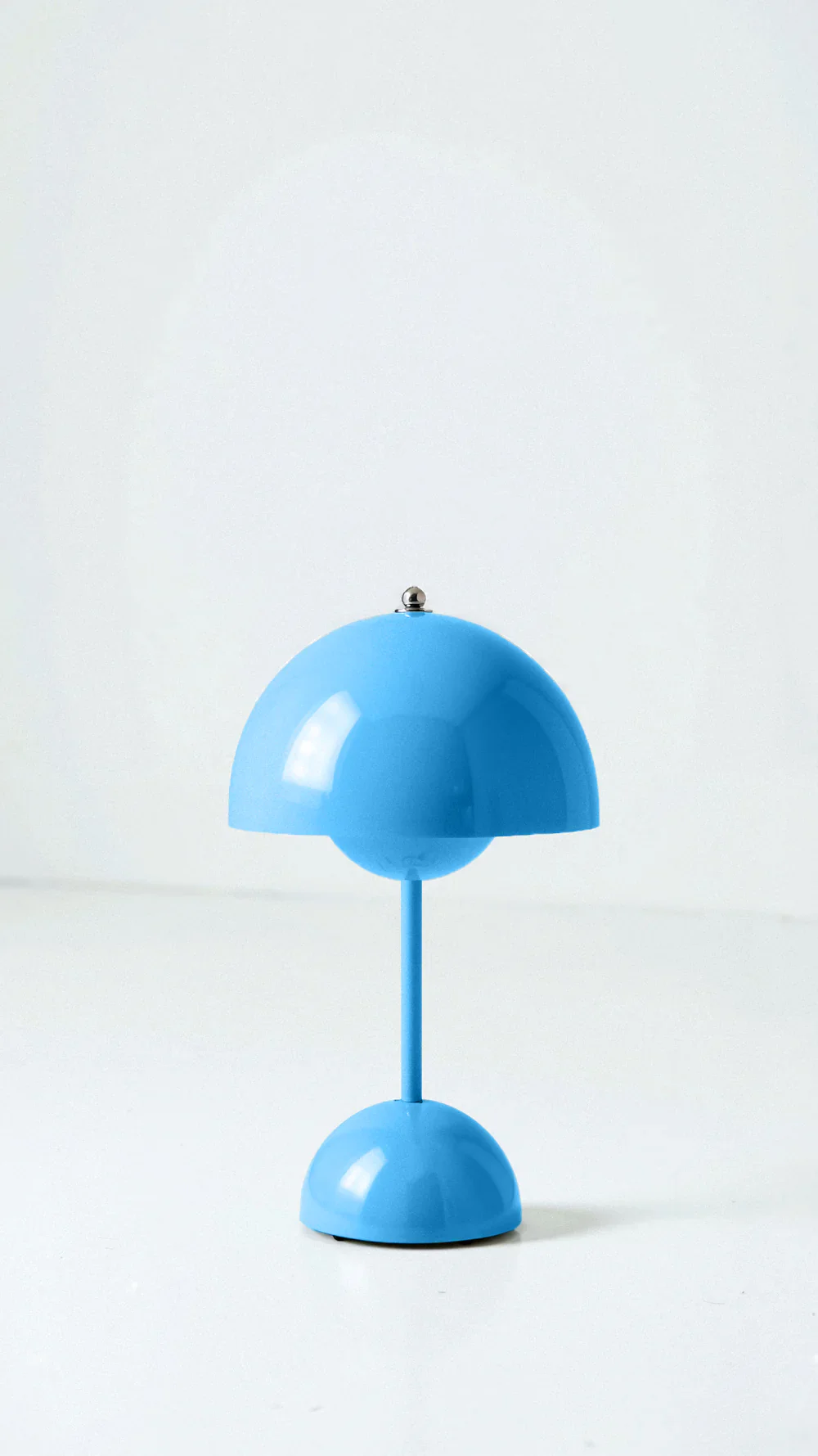 blue wireless mushroom nightlight isolated against a light background