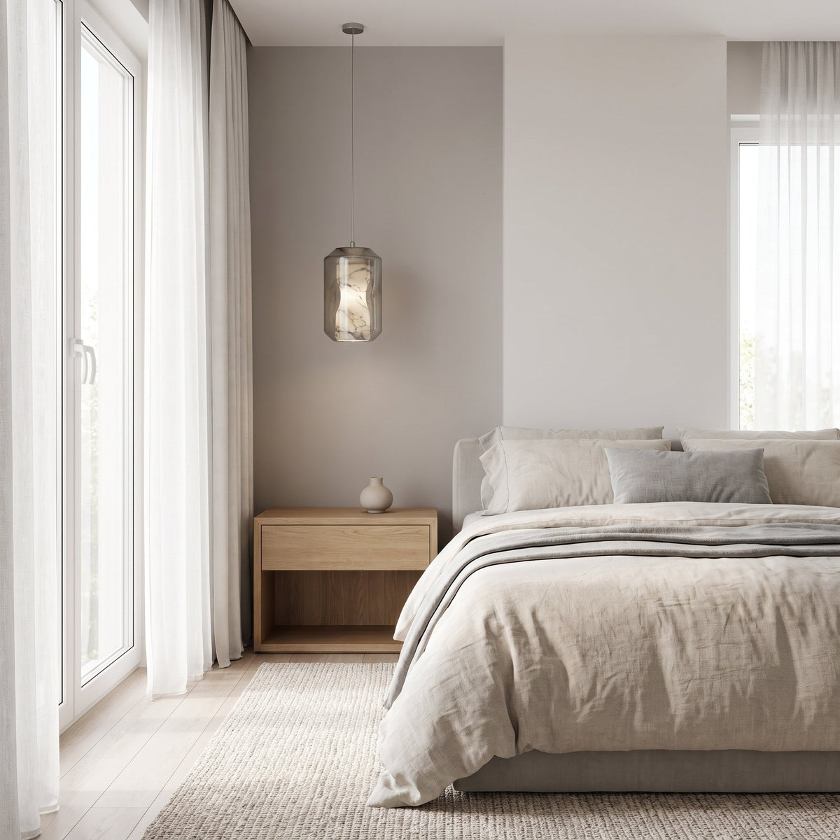 Bozla alabaster glass pendant light in a modern British minimalist bedroom setting