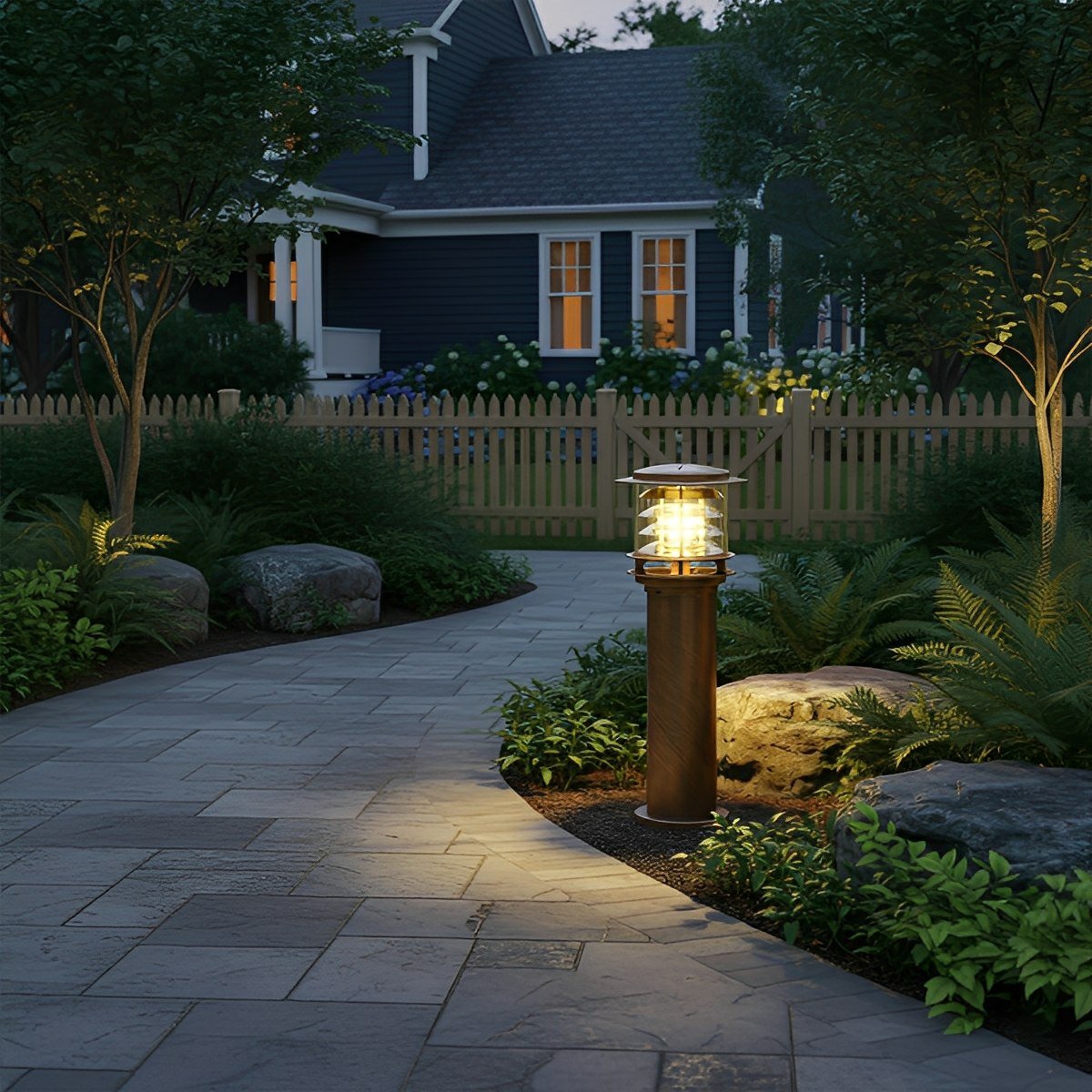 bulba bronze garden path light casting a warm, glare-free glow on a stone walkway at twilight