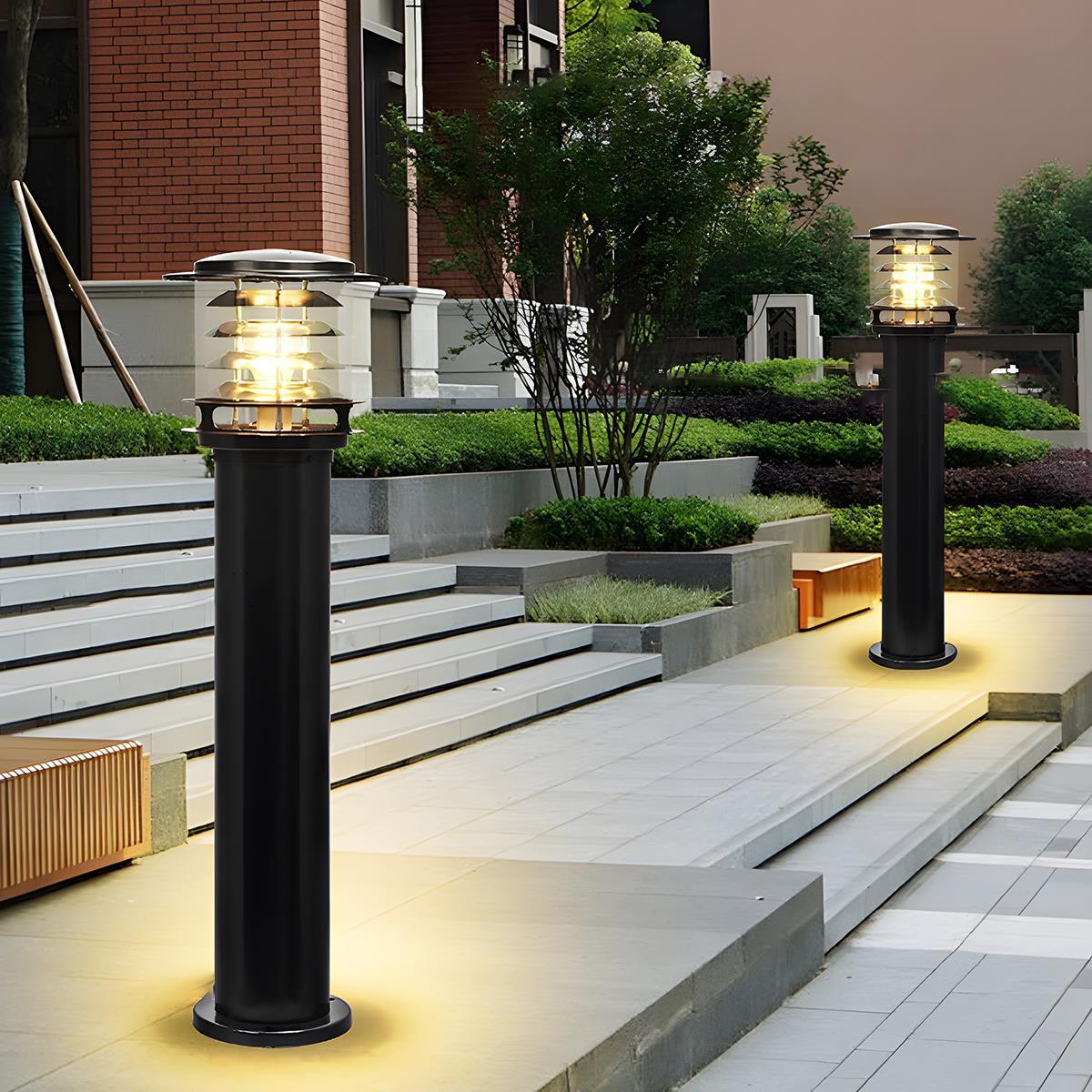 Bulba Tall black pathway bollard light providing elegant illumination for garden steps and a paved walkway