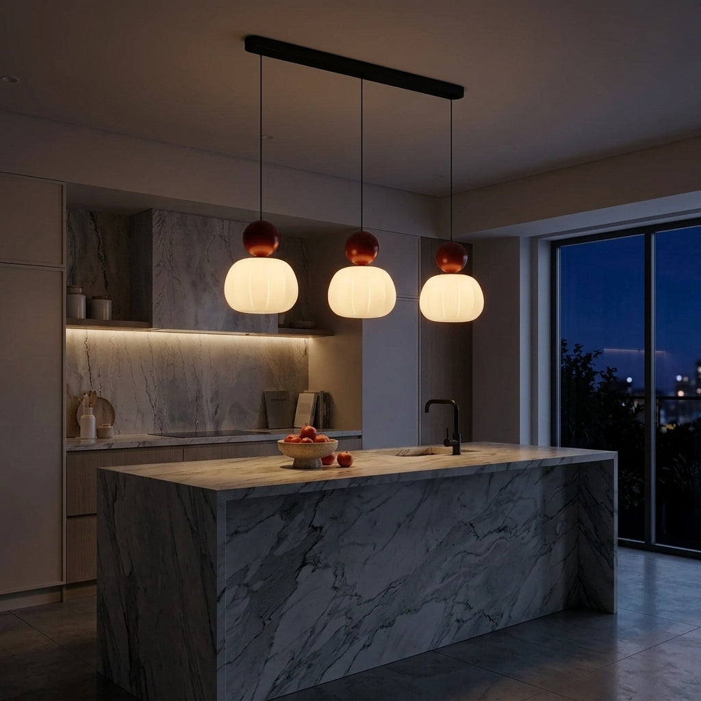 Modern chandelier pendant hanging over a kitchen island