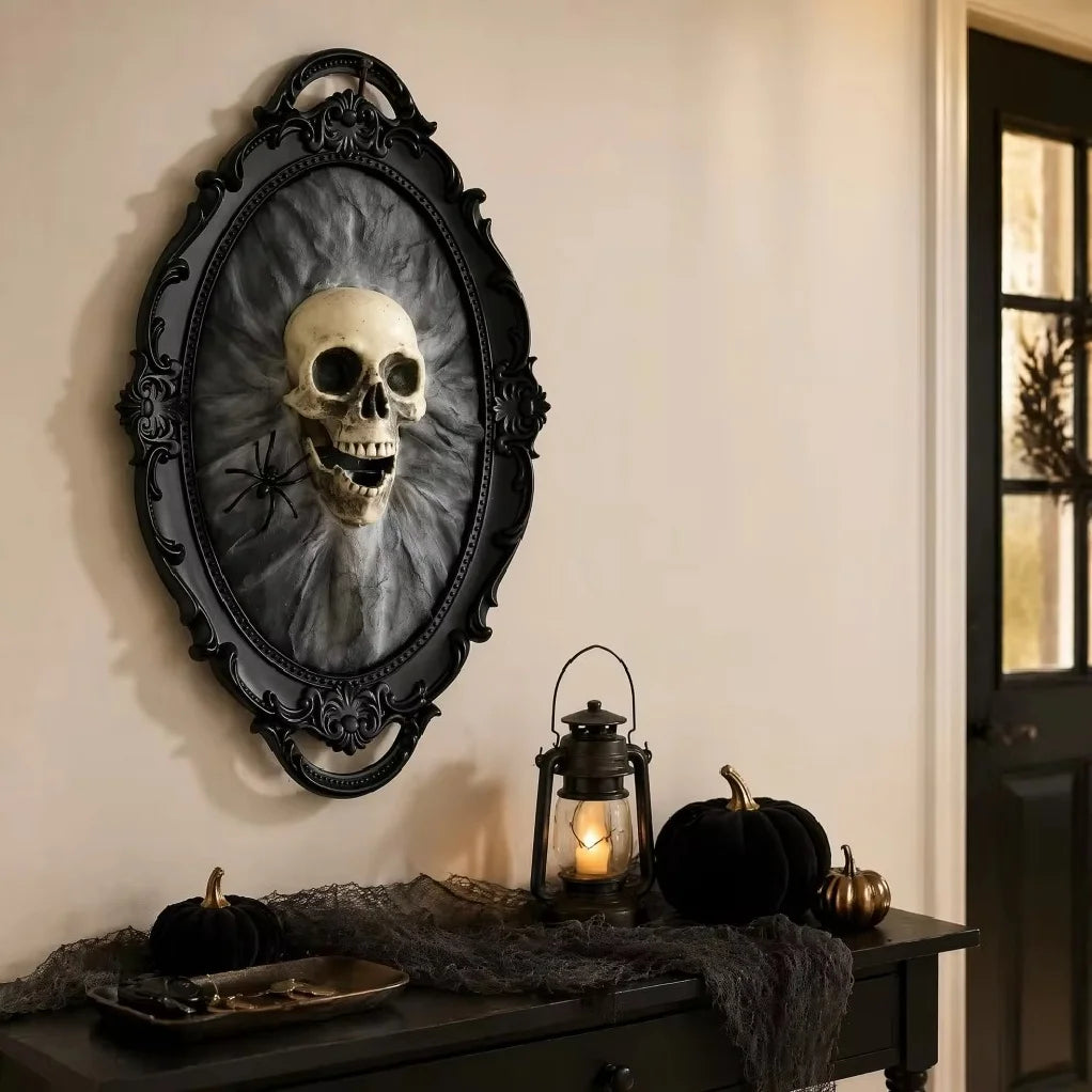 Cinder gothic skull wall plaque hanging in a Halloween entryway console display