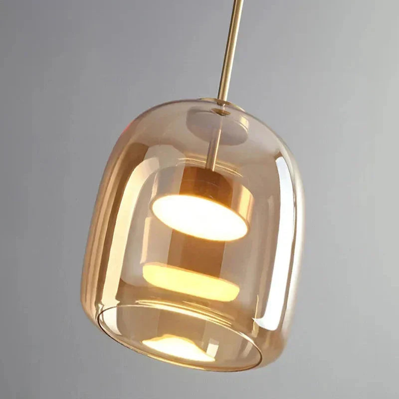 Close-up of the premium amber glass shade and integrated LED light core