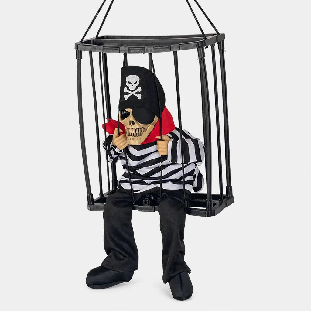 Croakley caged skeleton prop in skull and crossbones pirate bandana design on a plain studio background