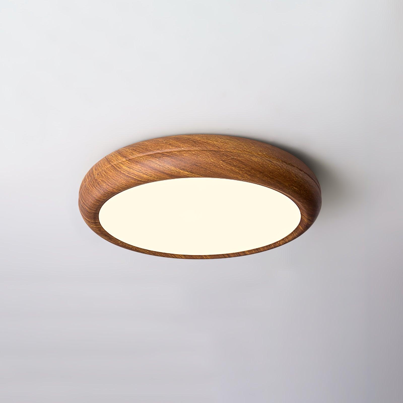 Front view of the curved walnut wood-effect LED ceiling light