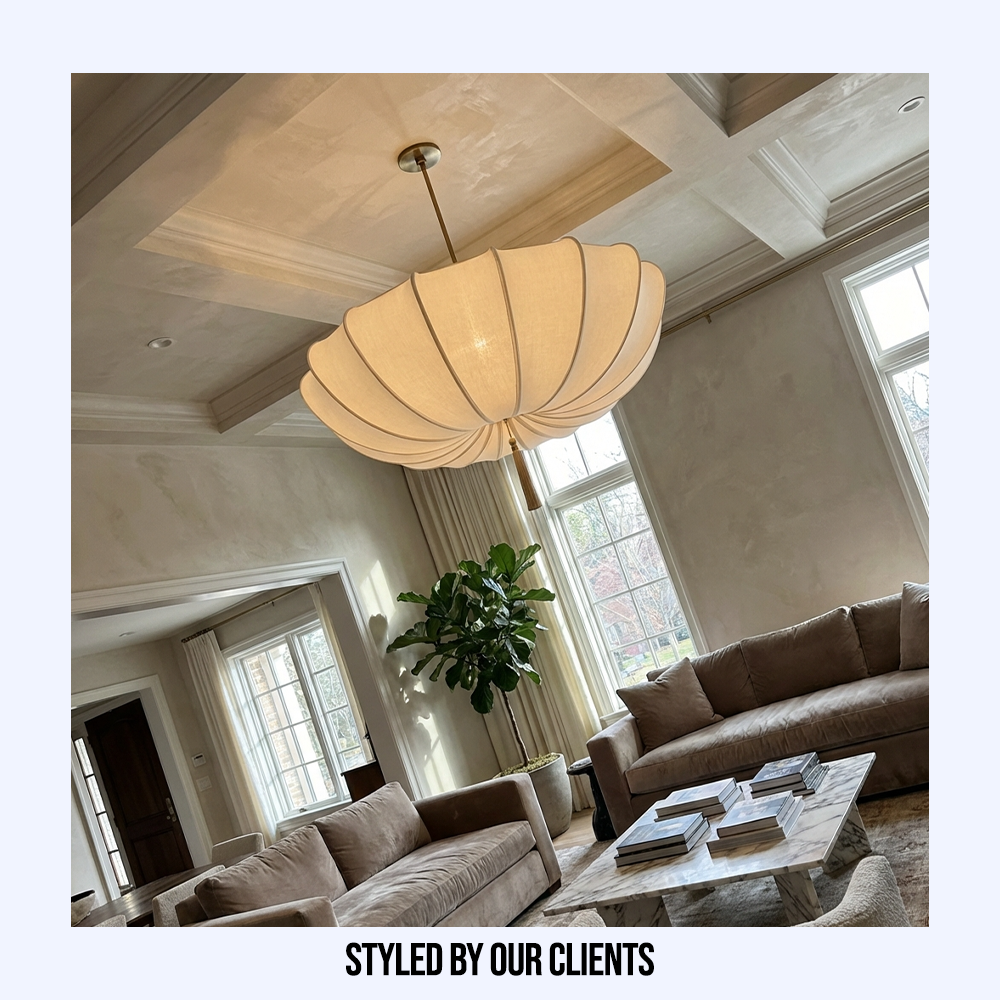 Customer styled Wabi-Sabi fabric pendant light suspended from a beautiful coffered ceiling in a modern living room