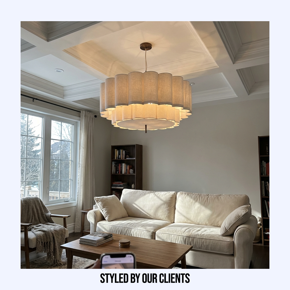 Customer styled Wabi-Sabi tiered pendant light providing a serene centrepiece in a living room with a coffered ceiling