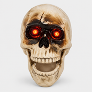 Darkle talking skull head Halloween prop, front view on a plain studio background