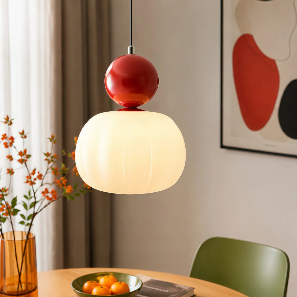 Bold red debz Bauhaus dome pendant light adding a striking pop of colour to a dining area