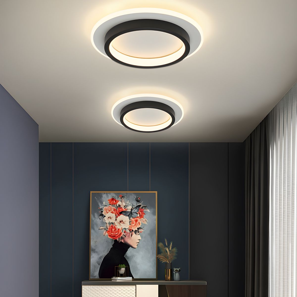Two black double-ring LED flush mount ceiling lights in a modern stylish bedroom