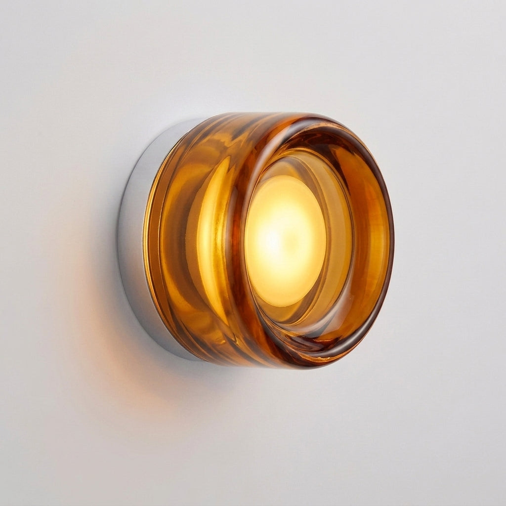 Doxlu amber glass wall sconce, illuminated, hero product shot