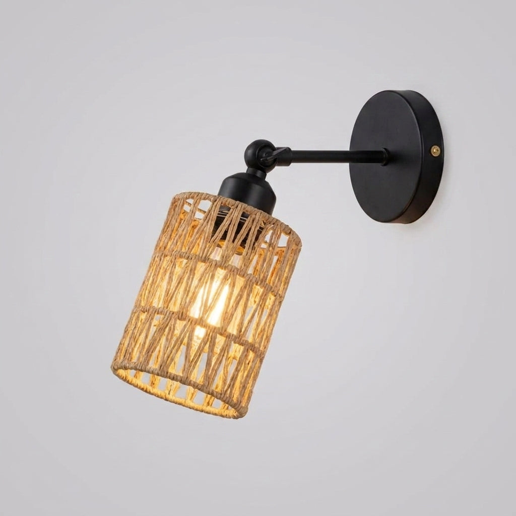 Emsul Japandi wabi-sabi rattan wall sconce with black iron arm on grey background