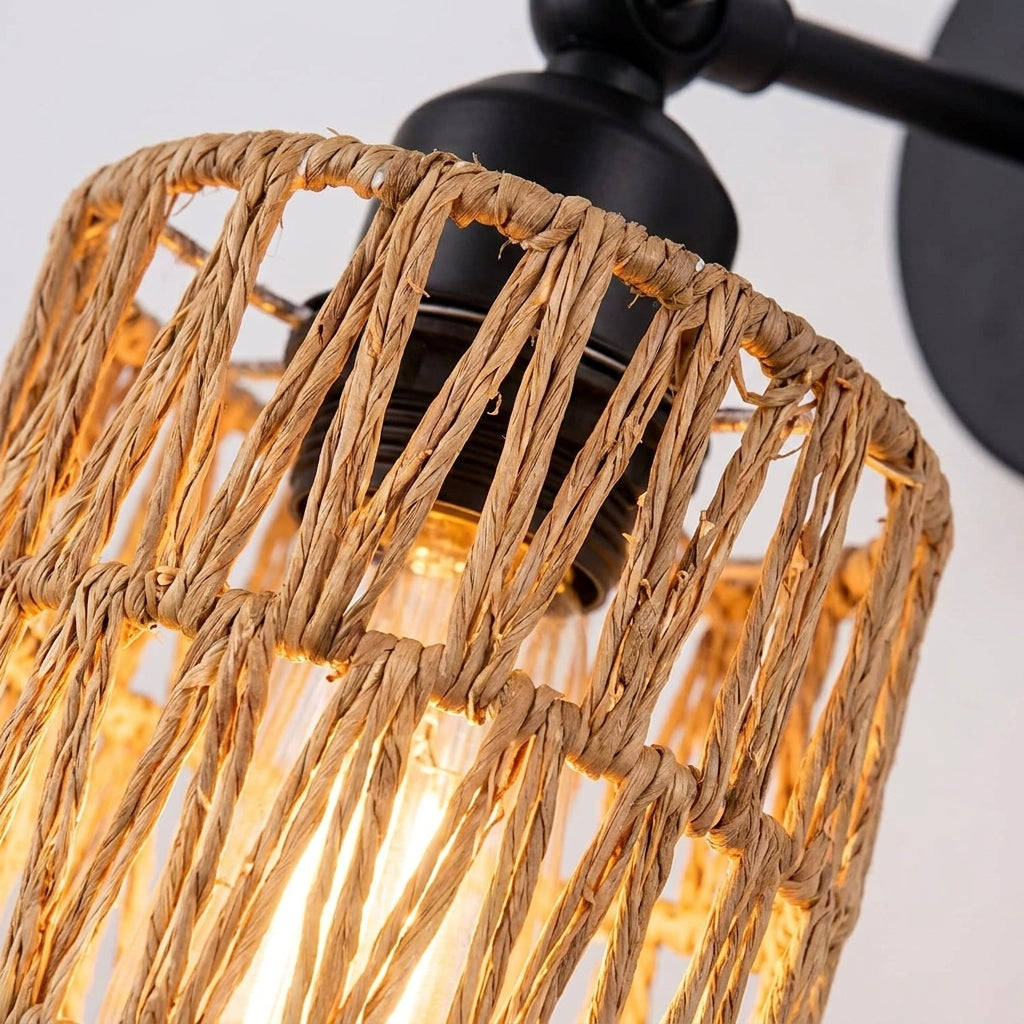 Close-up of hand-woven rattan shade on Emsul wall sconce showing woven texture
