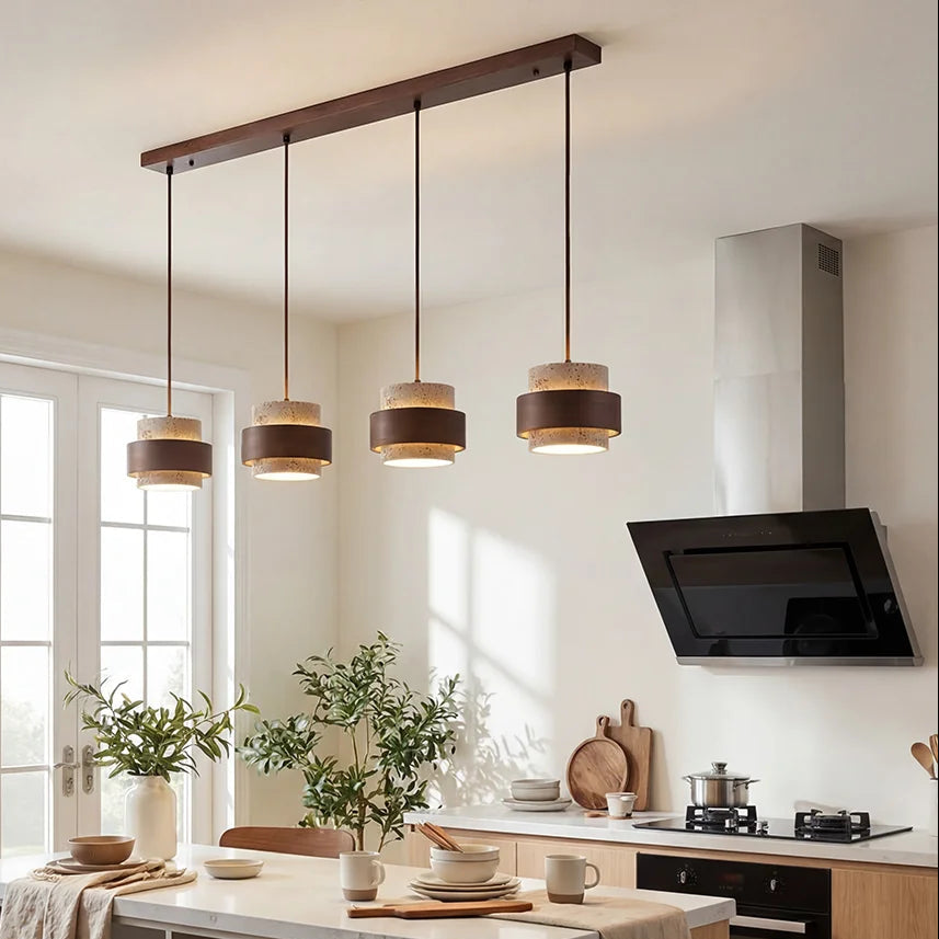 4-head travertine stone linear pendant acting as a striking kitchen island light fixture