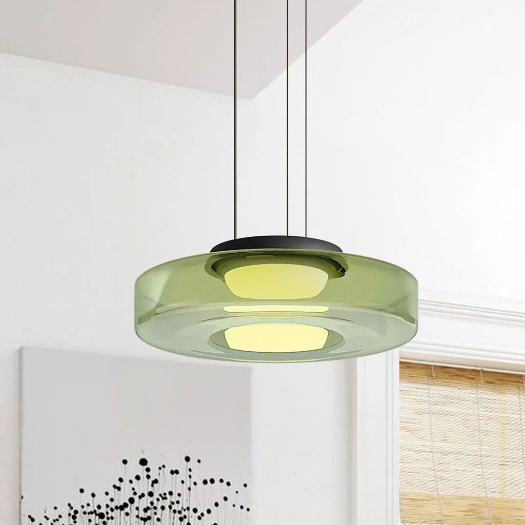 Green 1-layer fujs glass pendant light isolated in a bright, modern living space