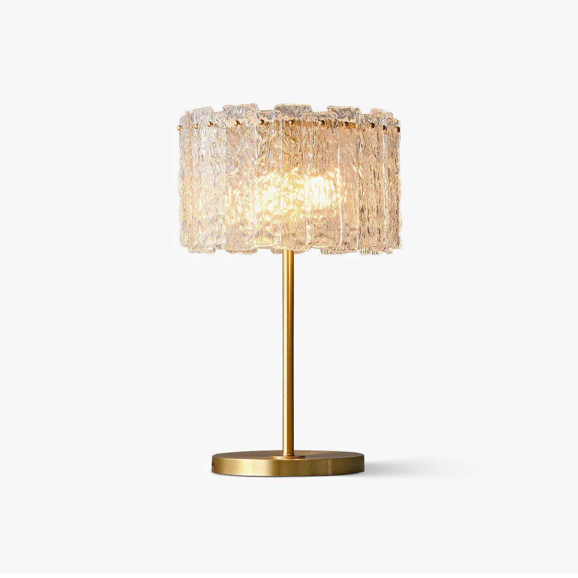 Luxury brass and textured glass fyns desk light showcasing its heavy, premium construction