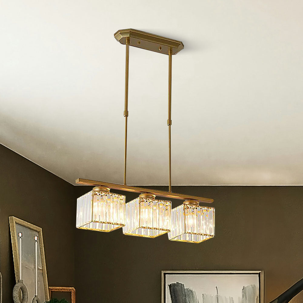 Gold 3-light square ribbed glass pendant providing striking contrast against a dark brown wall
