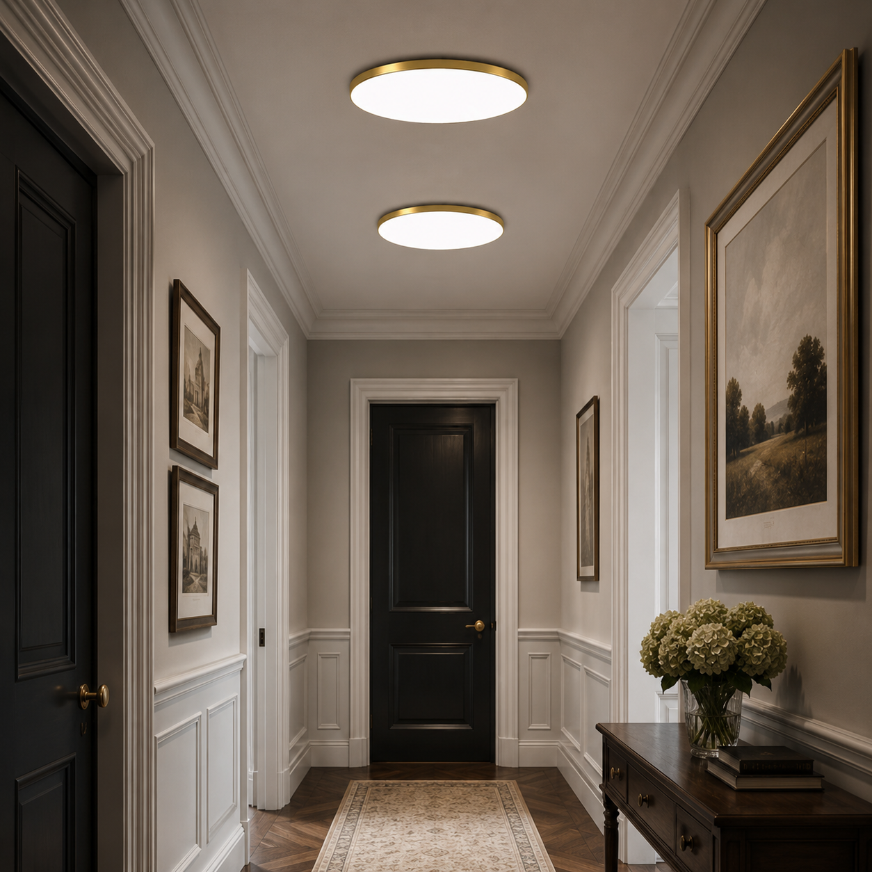 Two modern gold LED flush mount ceiling lights providing bright, even illumination in a classic hallway