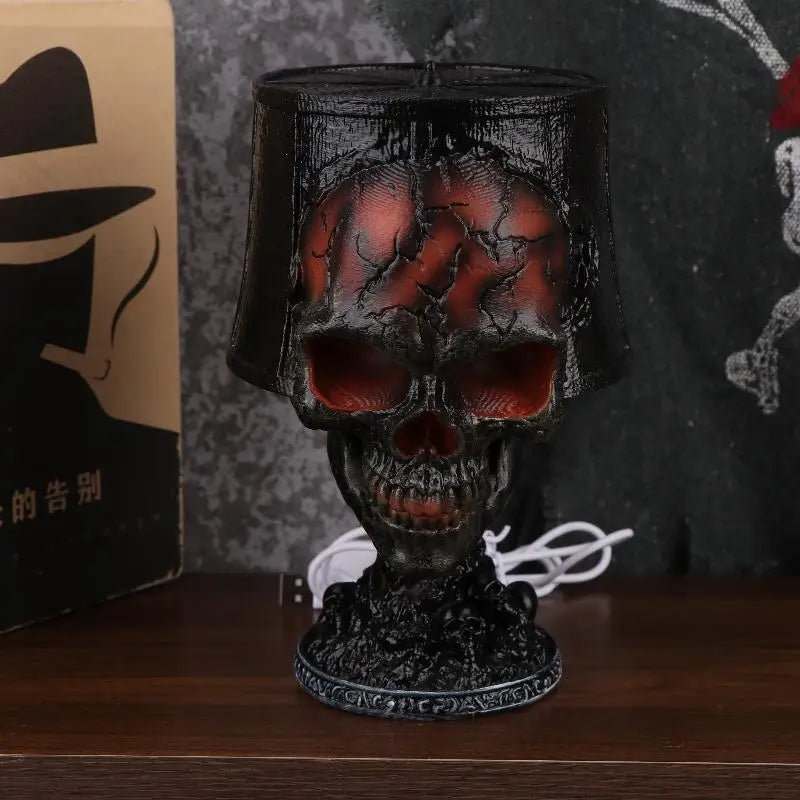 Gorren gothic skull lava lamp lit up with USB power cable and packaging box in the background