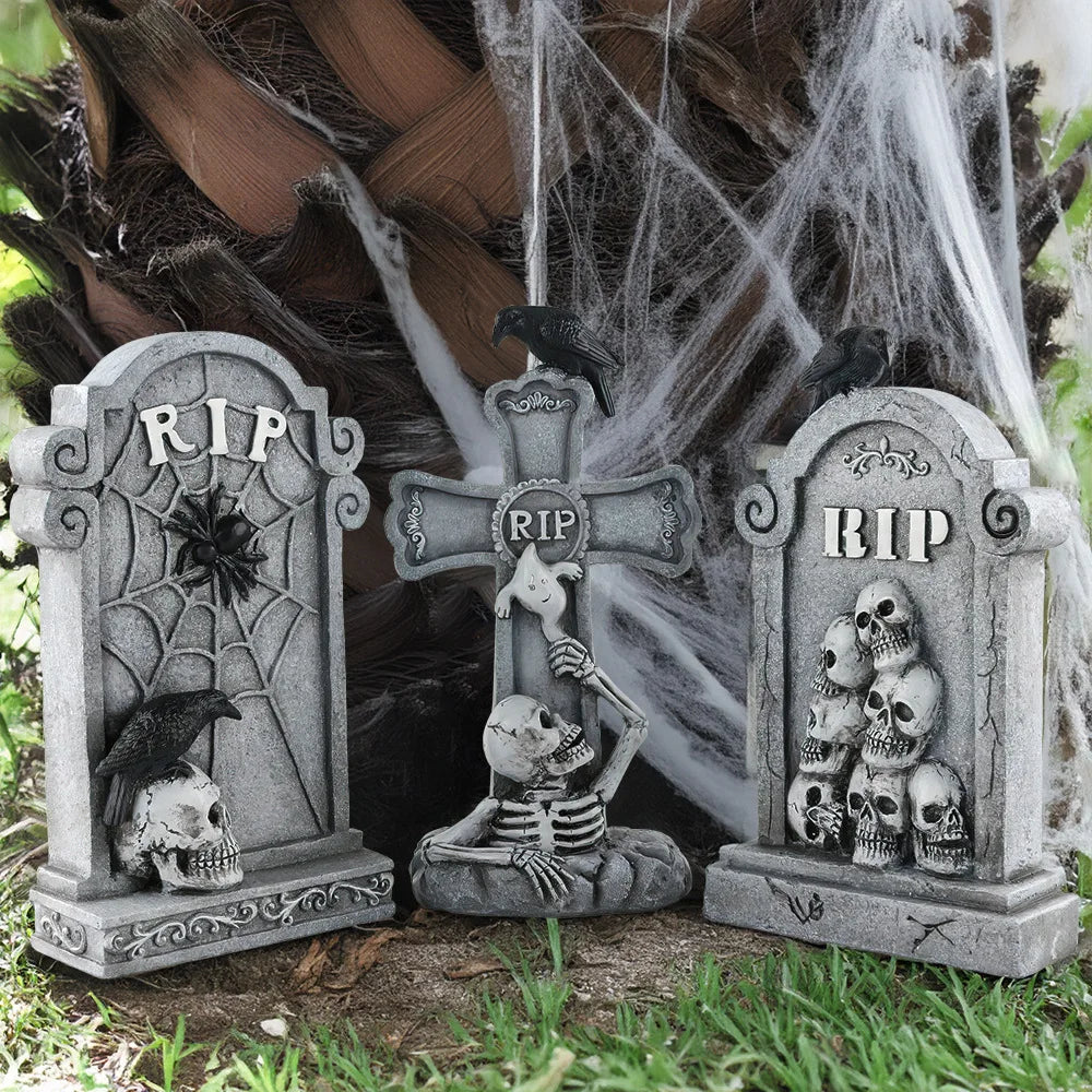 Grimslab RIP tombstones, all three designs, against a spiderweb Halloween backdrop