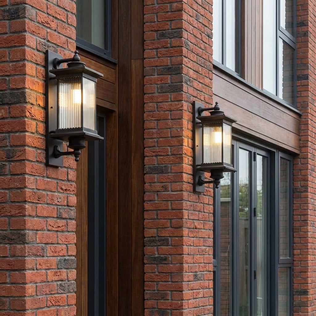 Gumzi exterior lantern wall lights beside a wooden door