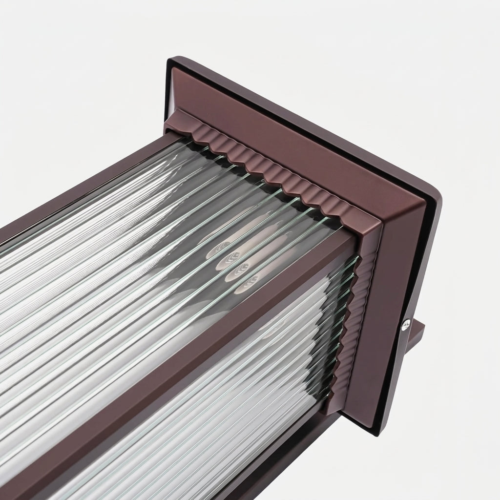Gumzi exterior lantern wall light close-up of ribbed glass panel