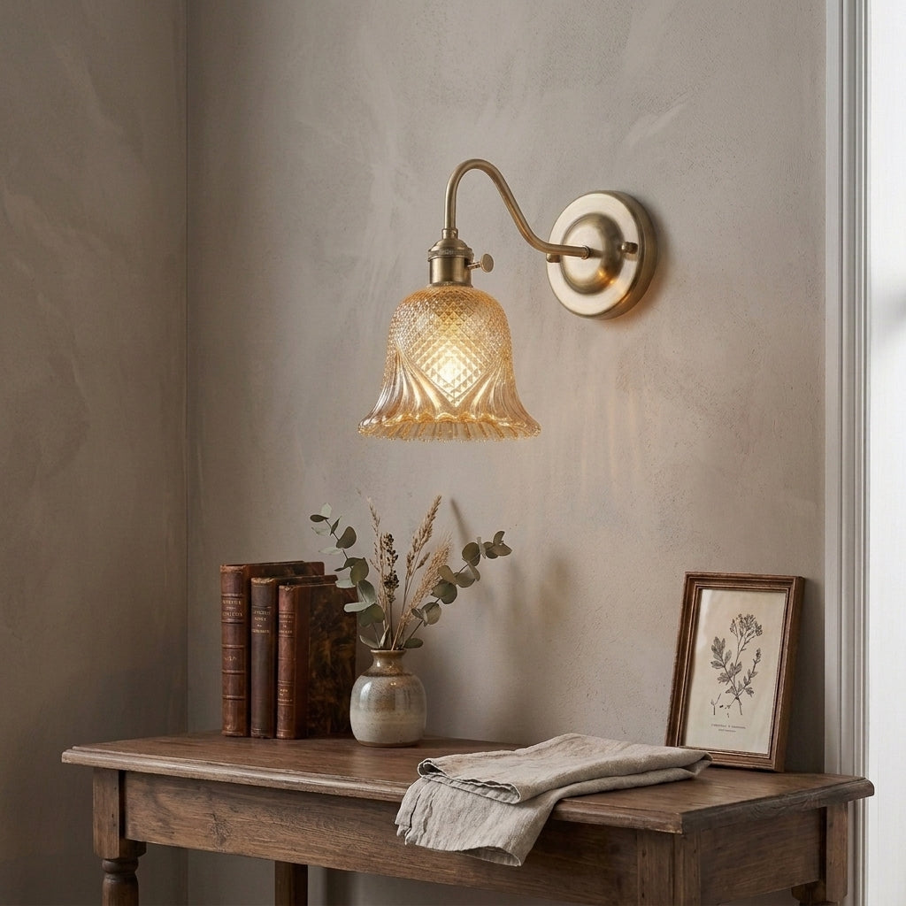 Hivqa wall sconce mounted above a wooden console table with books and flowers