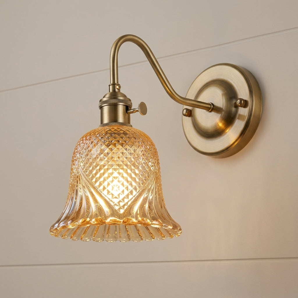 Hivqa wall sconce with clear diamond-cut glass shade, front view studio shot