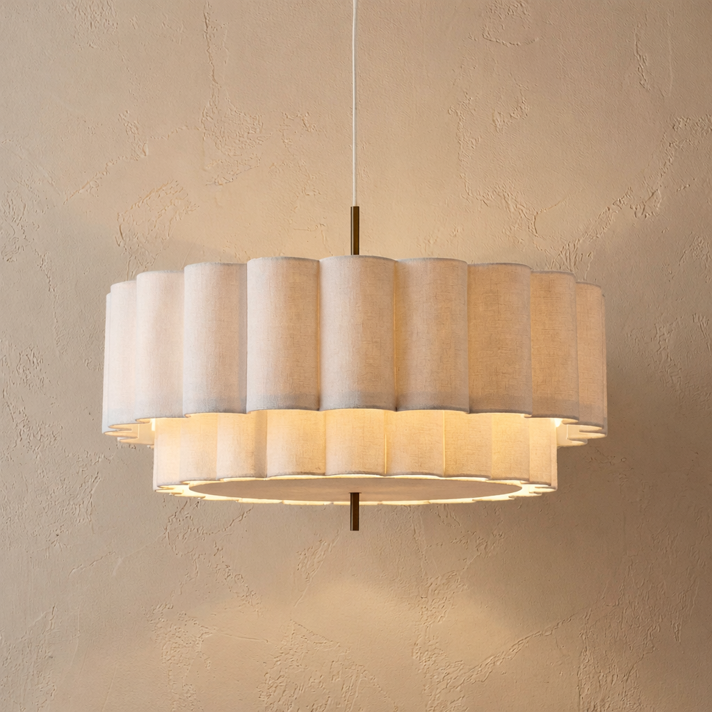Close-up of the Japanese Wabi-Sabi pleated fabric tiered ilop pendant light casting a warm, glare-free glow