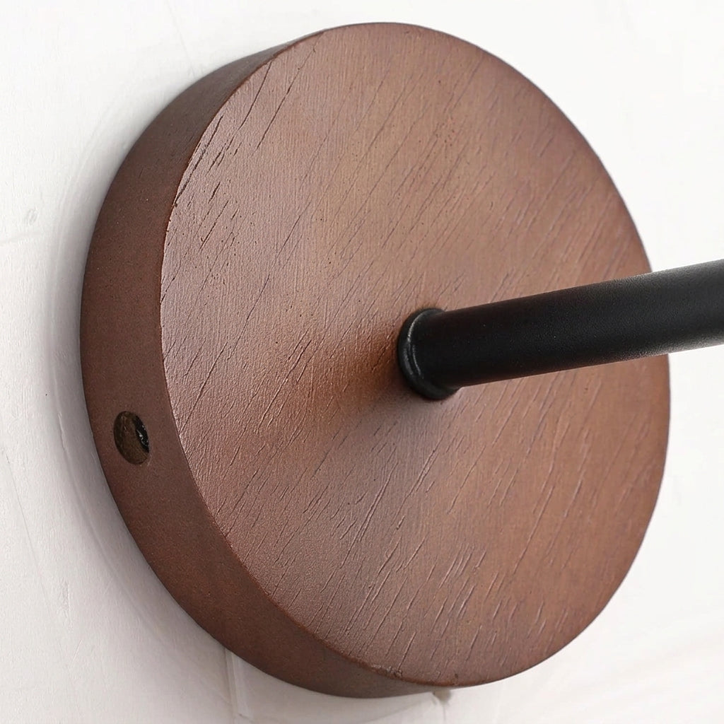 Imzo wood backplate and black metal arm joint close-up
