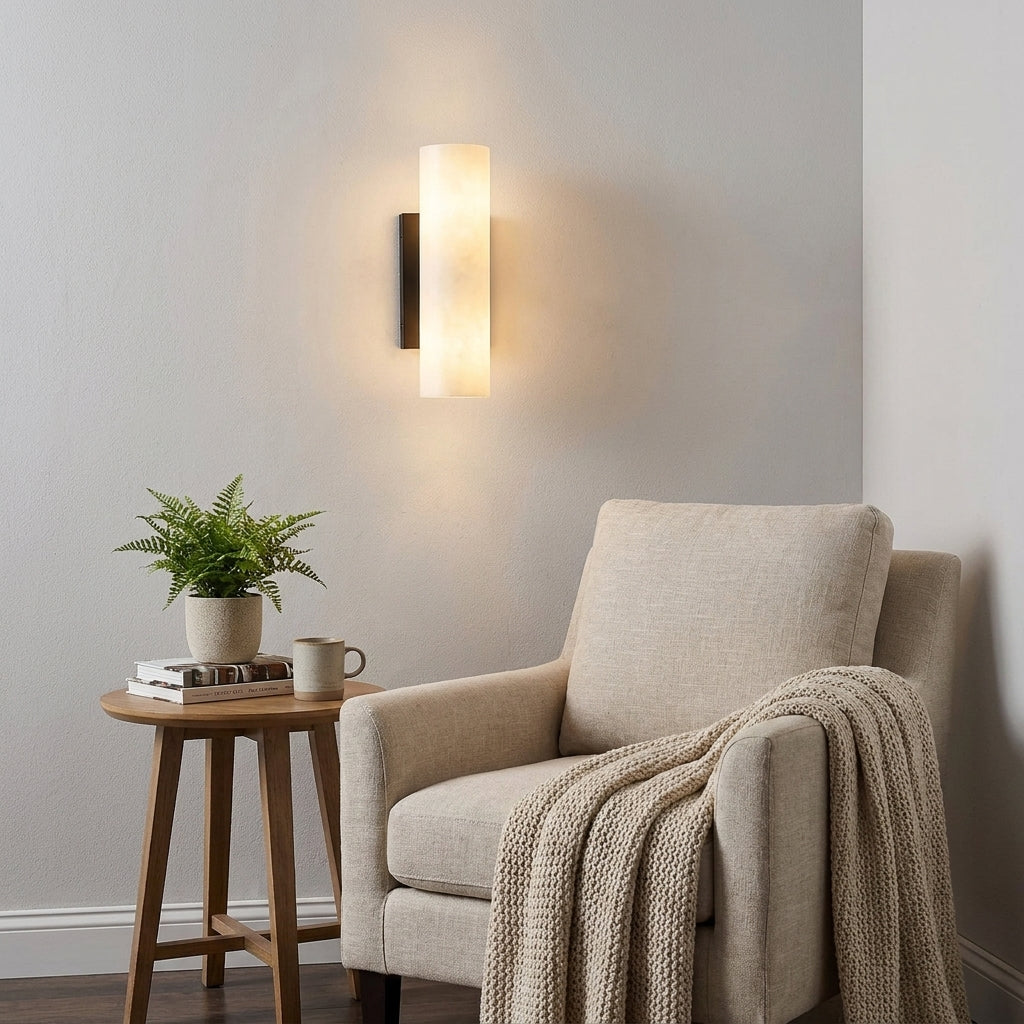 Ivzo alabaster column wall sconce in black finish, studio product shot