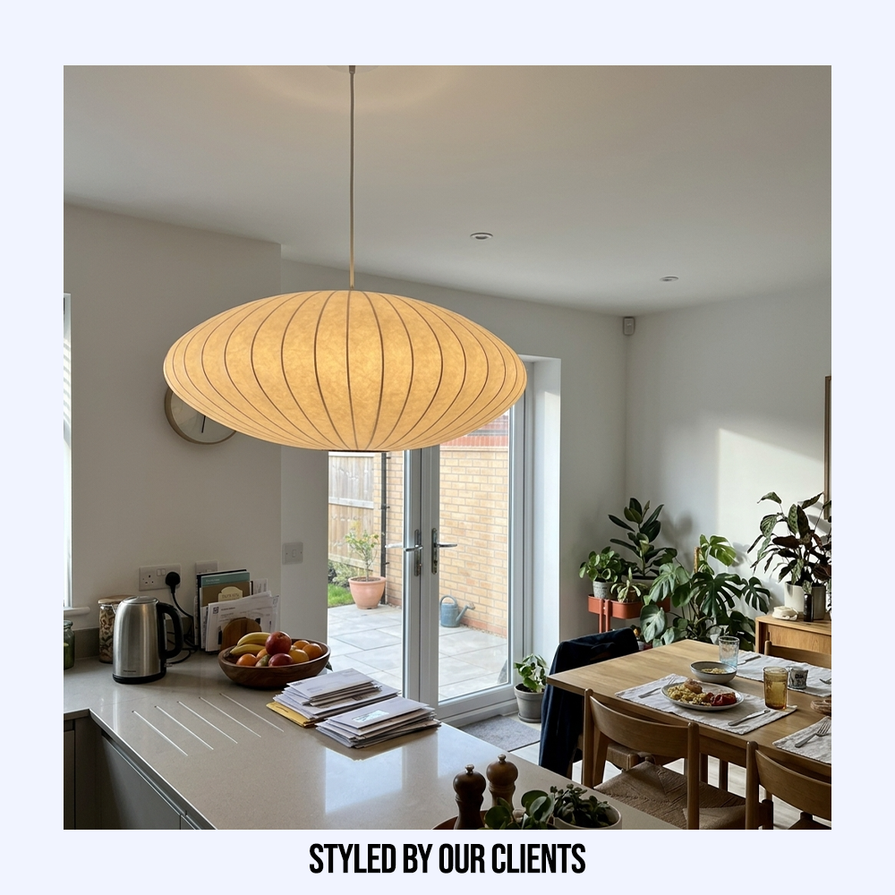 Customer styled Japanese silk pendant light hanging elegantly above a modern kitchen island