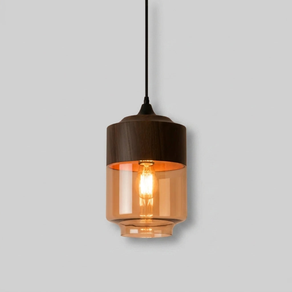 Jovli Type C wood-grain cylinder pendant light with flared amber glass base, studio shot